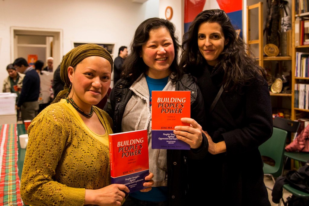 Joe Lampasa, Dr. Angie Gonzales and Paloma Polo hold a copy of the book